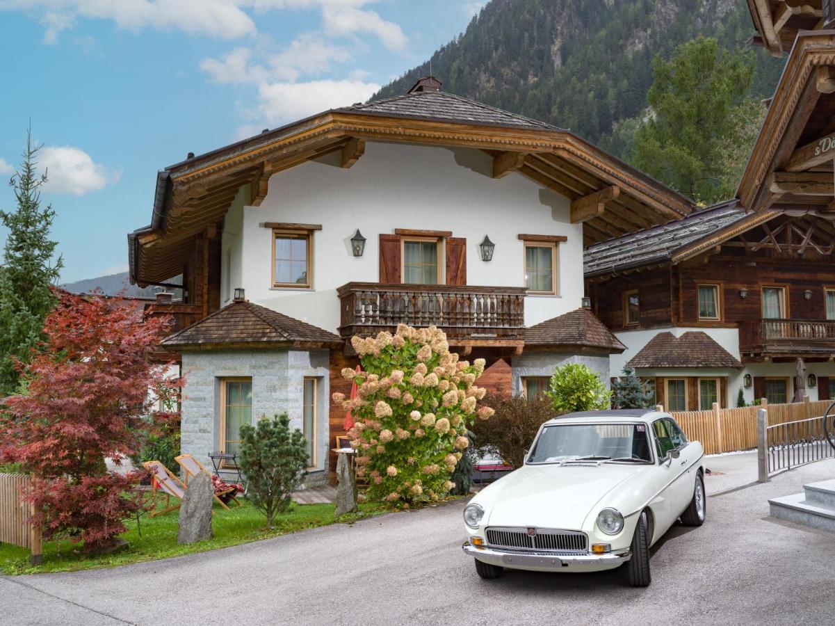 S'Doerfl Chalets ไมย์อาโฮเฟิน ภายนอก รูปภาพ